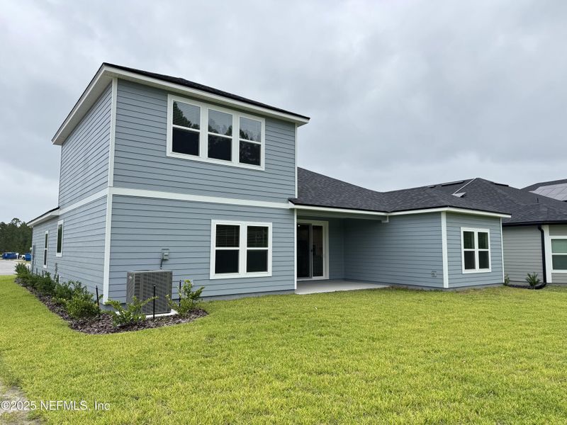 Exterior details and patio area of a home in Hyland Trail, Green Cove Springs (Image 20).