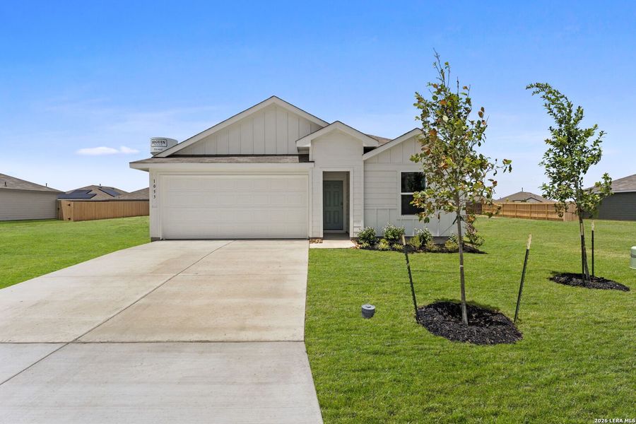 Front exterior of a new home in Navarro Fields, Seguin, TX, highlighting curb appeal (Image 1). Front exterior of a new home in Navarro Fields, Seguin, TX, highlighting curb appeal (Image 1).