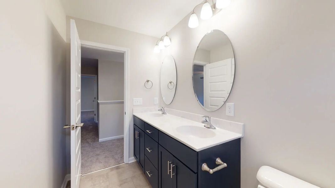 Representative furnished interior of a home built from the Westin A by JC Jackson Homes,LLC in Heritage Pointe, Newport (Image 7).