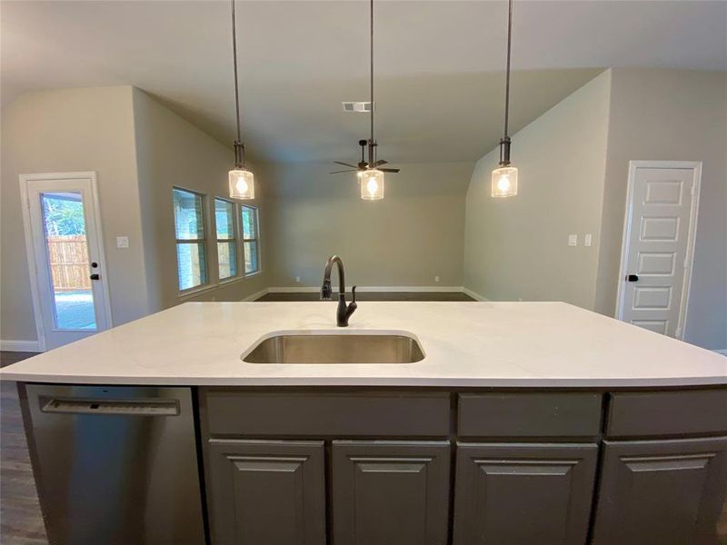 View from massive kitchen island towards family room View from massive kitchen island towards family room