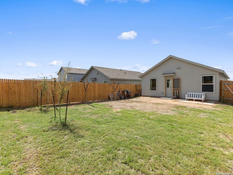 Exterior details and patio area of a home in Rose Valley, Converse (Image 26).