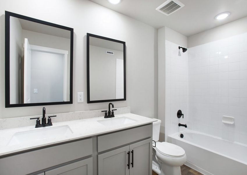 One of the secondary bathrooms has a tub/shower combo.