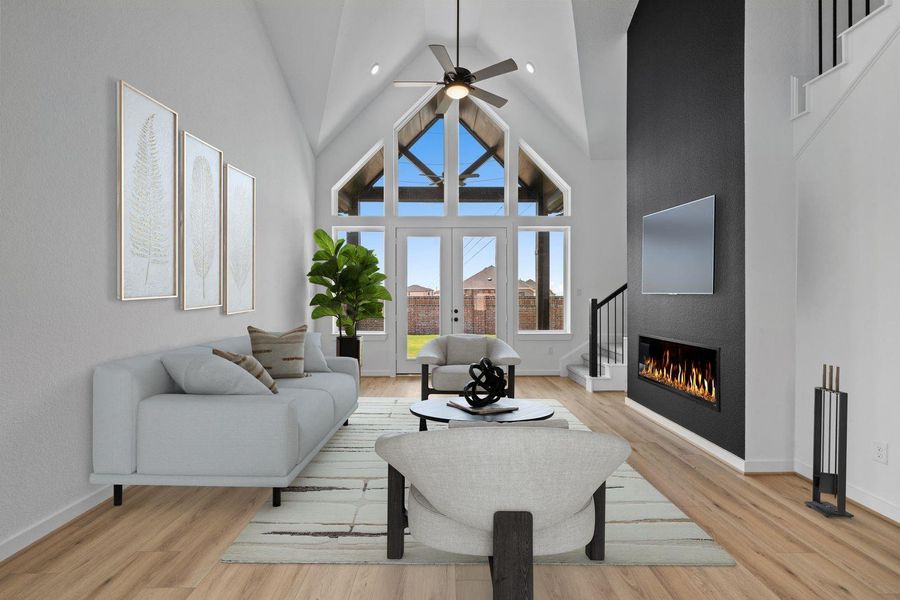 The floor to ceiling decorative accent wall with fireplace adds elegance and warmth to this beautiful space. The floor to ceiling decorative accent wall with fireplace adds elegance and warmth to this beautiful space.