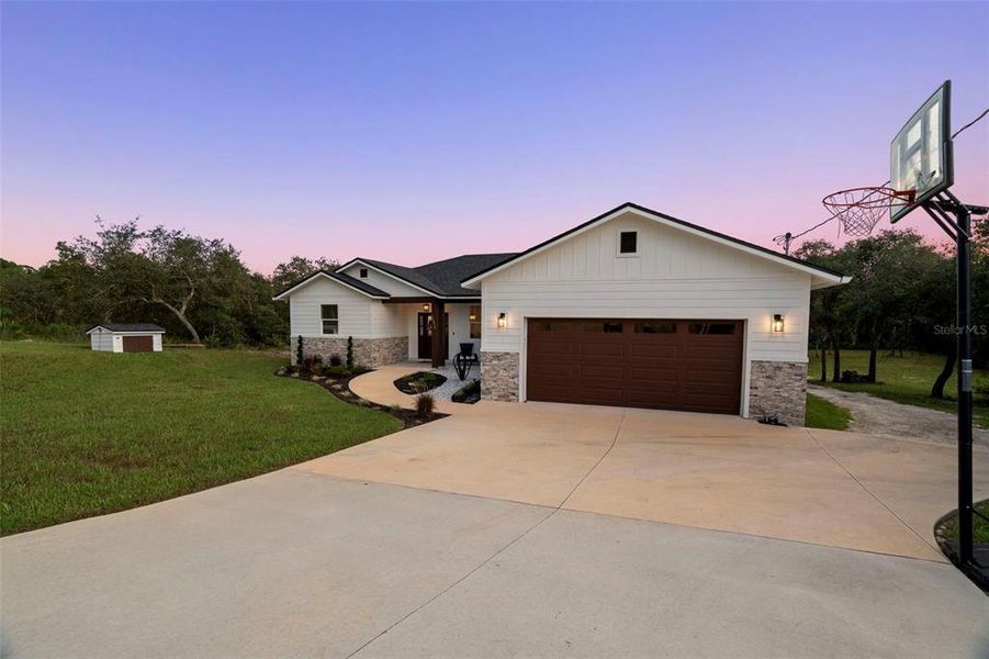 Front exterior of a new home in , Webster, FL, highlighting curb appeal (Image 18).