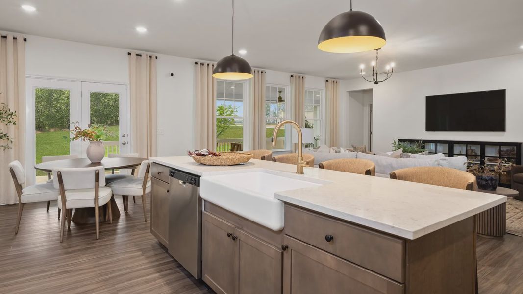 Townsend home plan open concept kitchen overlooking breakfast area and living room
