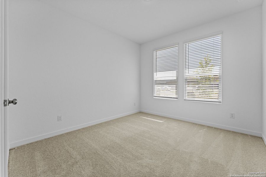 Spacious, unfurnished interior of a new home in Waterwheel: Coastline Collection, San Antonio (Image 13).