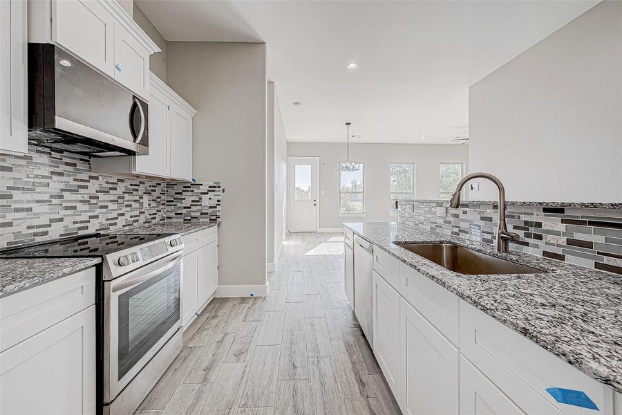 Furnished interior view inside a new home in , Needville (Image 6).