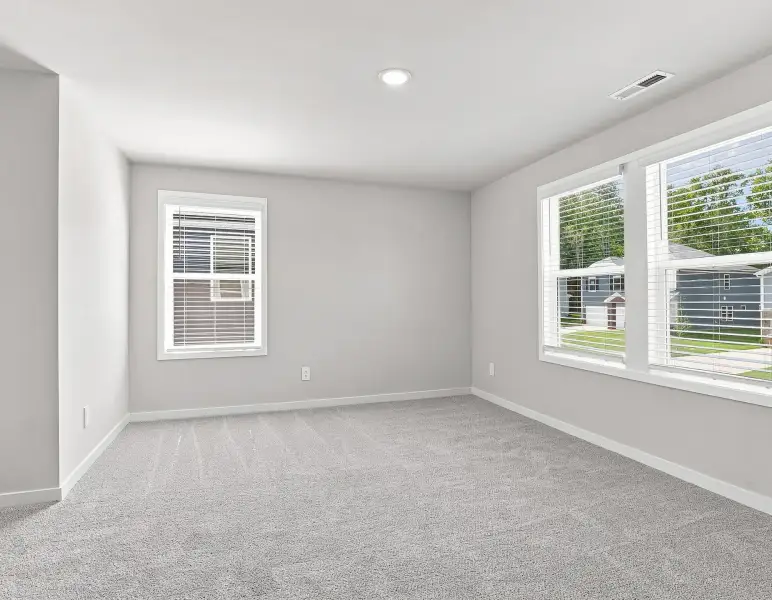 Spacious, unfurnished interior of a new home in Country Lane - Classic Series, Clayton (Image 13).