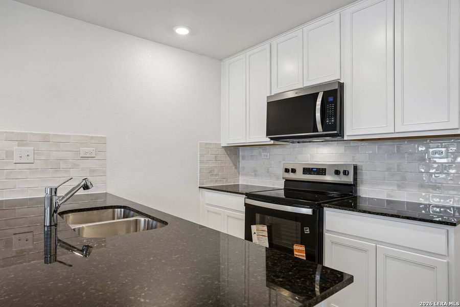 Furnished interior view inside a new home in Southton Cove, Elmendorf (Image 5).