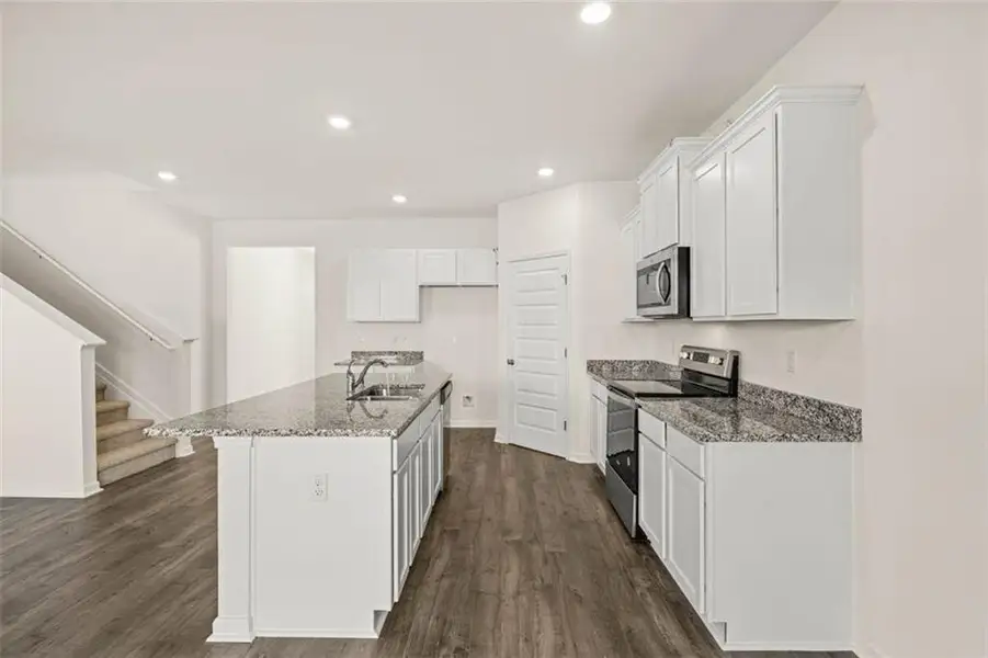 Furnished interior view inside a new home in Teamon Pointe, Griffin (Image 6).