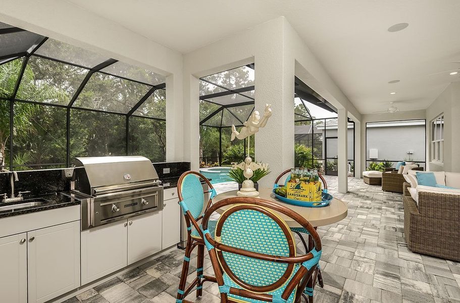 Representative furnished interior of a home built from the Kiawah 2 by Neal Communities in Grand Palm, Venice (Image 10).