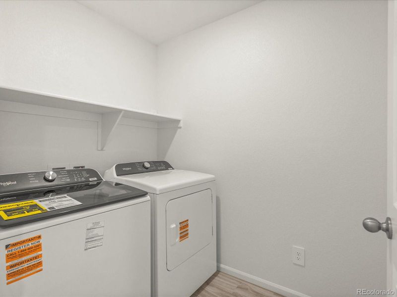 Furnished interior view inside a new home in Skyview at High Point, Aurora (Image 5).