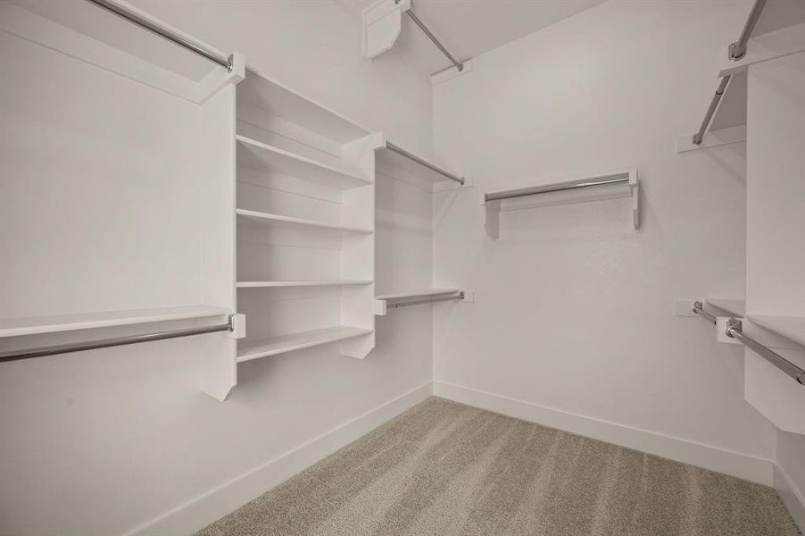 You'll find a wonderful owners closet complete with seasonal hanging racks in our Bella plan.