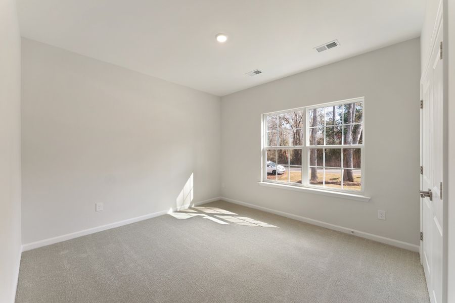 Spacious, unfurnished interior of a new home in Landing at Pine Lake, Anderson (Image 20).