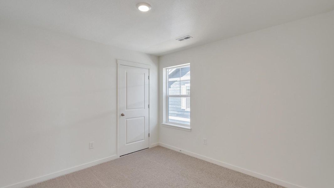 Spacious, unfurnished interior of a new home in Sky Ranch, Watkins (Image 13).