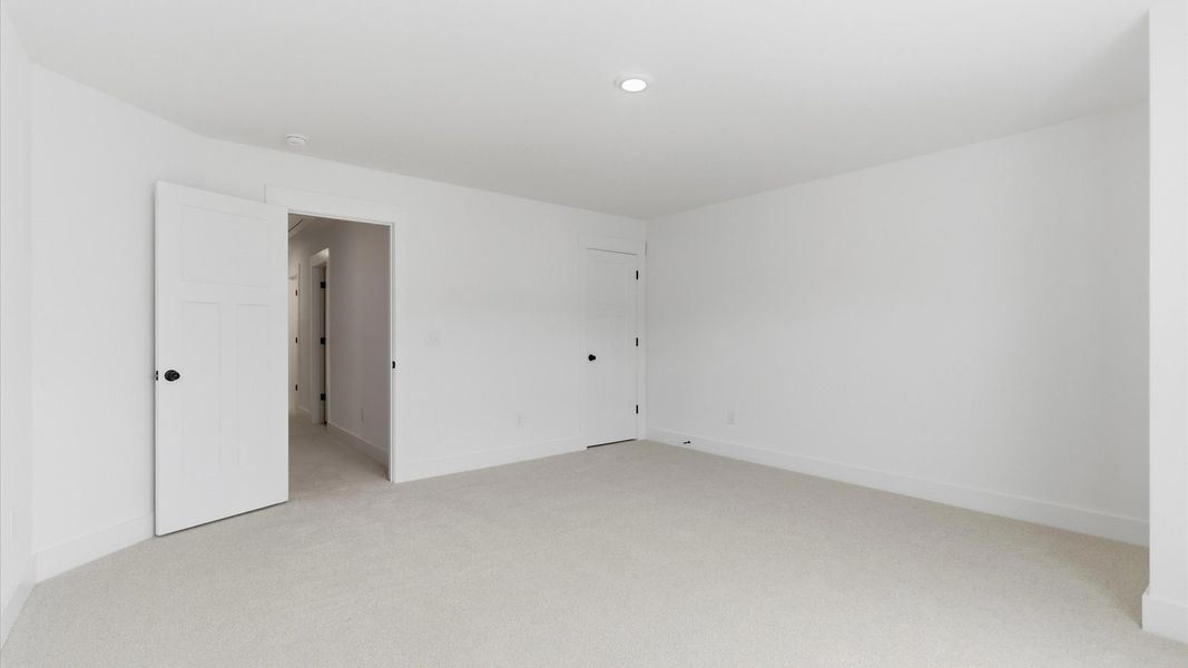 Furnished interior view inside a new home in Village at Midway, Anderson (Image 23).