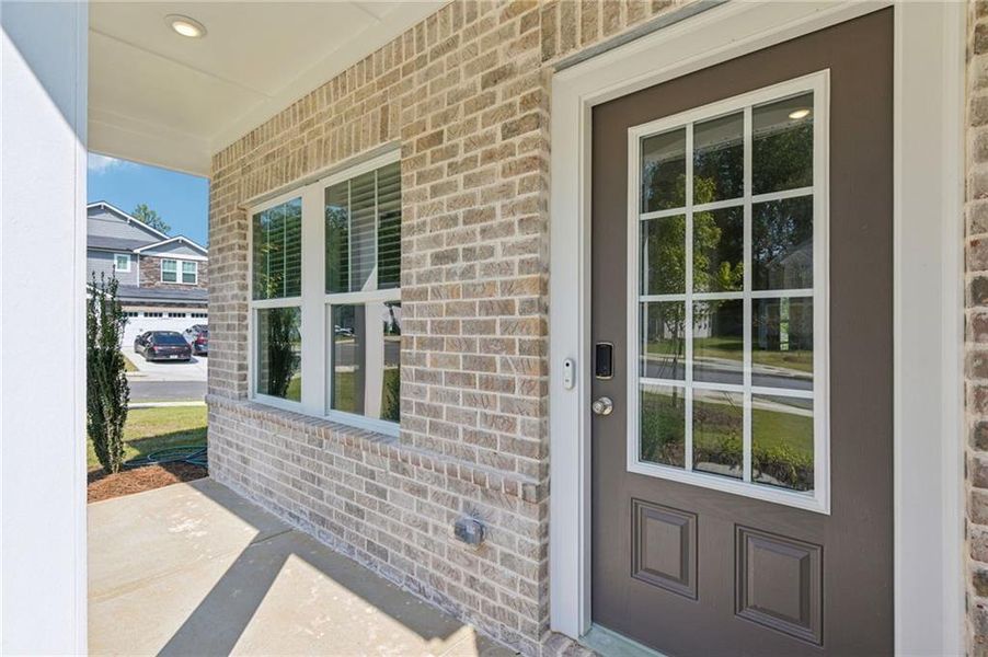 Exterior details and patio area of a home in The Oaks at Dawson, Dawsonville (Image 18).
