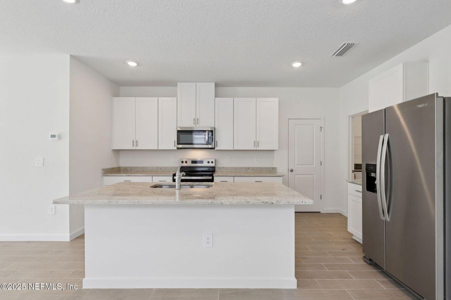Furnished interior view inside a new home in Cypress Meadows - Classic Series, Jacksonville (Image 13).