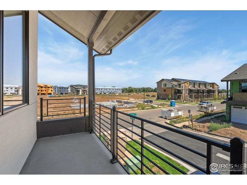 Exterior details and patio area of a home in Northfield - The Flats, Fort Collins (Image 2).