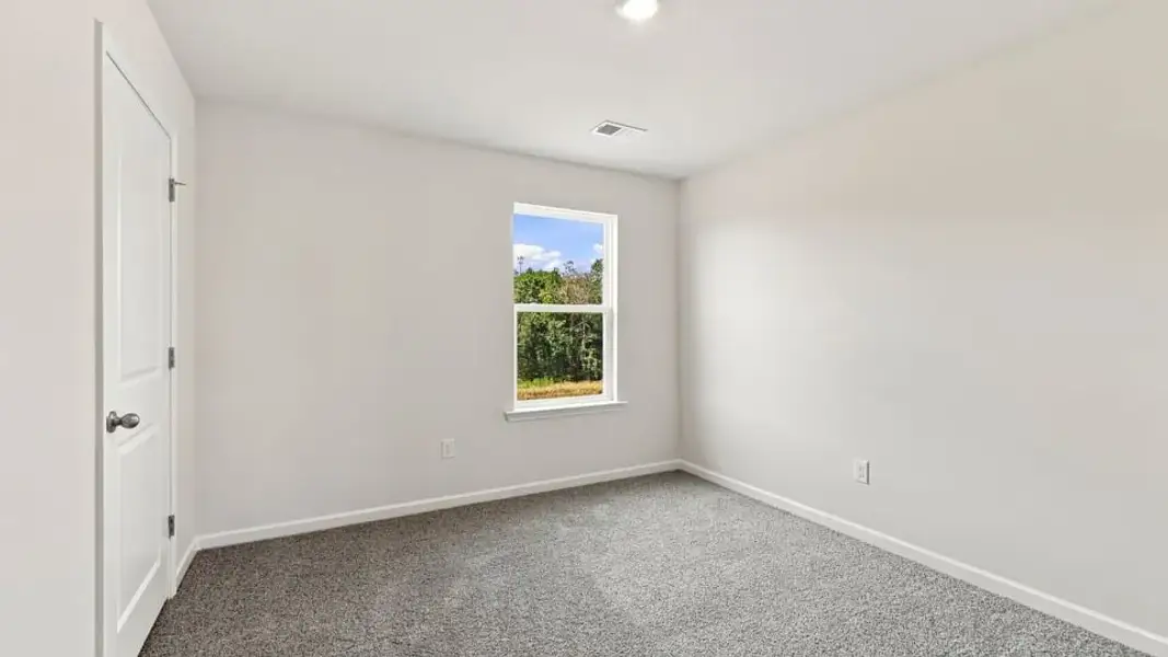 Spacious, unfurnished interior of a new home in Rocky River Ridge, Anderson (Image 33).