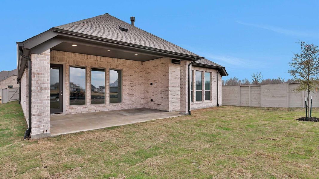 Exterior details and patio area of a home in Legacy 50', League City (Image 3).