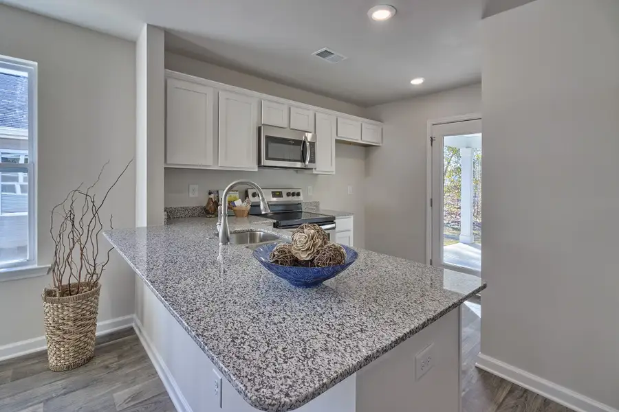 Representative furnished interior of a home built from the Dogwood A by McGuinn Homes in Reserves at Mill Creek, Columbia (Image 10).