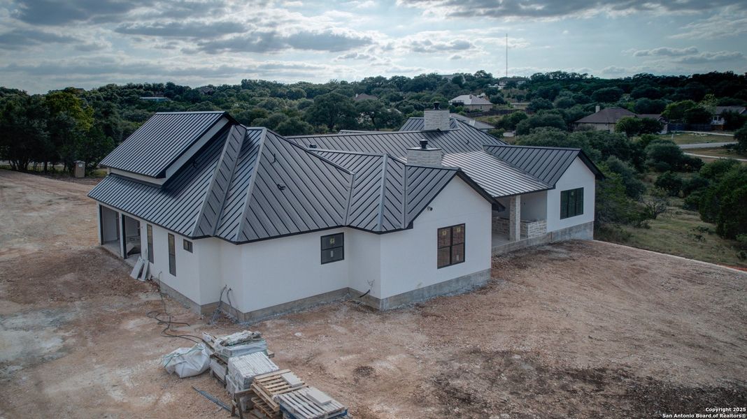 Front exterior of a new home in , New Braunfels, TX, highlighting curb appeal (Image 10). Front exterior of a new home in , New Braunfels, TX, highlighting curb appeal (Image 10).