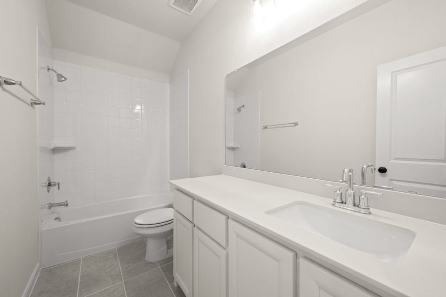 Furnished interior view inside a new home in Creekview Meadows, Pilot Point (Image 11).