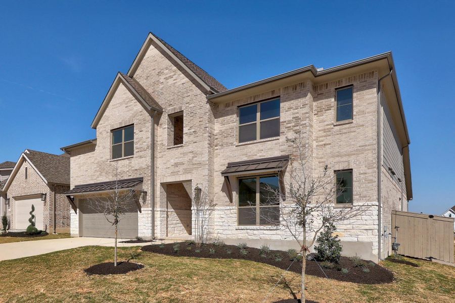 Front exterior of a new home in Flora - 60', Hutto, TX, highlighting curb appeal (Image 18).
