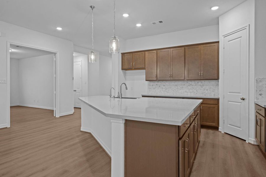 This kitchen is not only a functional space but also has ample storage. Whether you're a seasoned chef or just love to gather and enjoy good food, this kitchen is a dream come true.