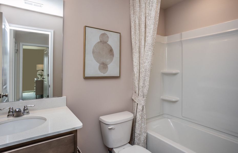 Furnished interior view inside a new home in Exchange at 401, Raleigh (Image 12).