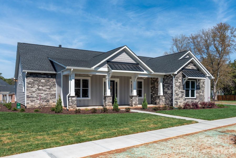 Front exterior of a new home in Bailey's Glen, Huntersville, NC, highlighting curb appeal (Image 22).