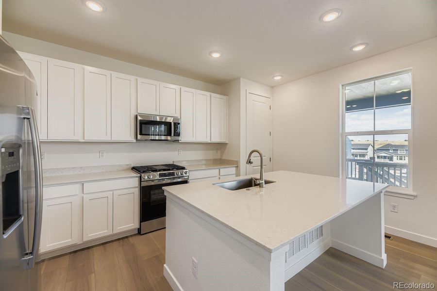 Furnished interior view inside a new home in Ken-Caryl Ranch: The Monarch Collection, Littleton (Image 4).