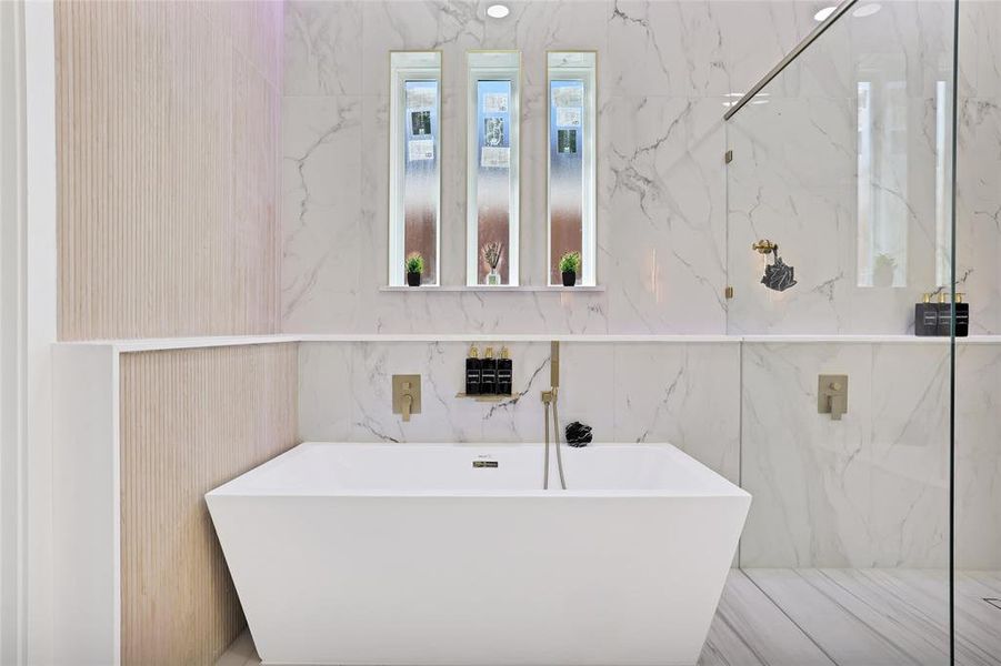 Full bathroom featuring a freestanding bath