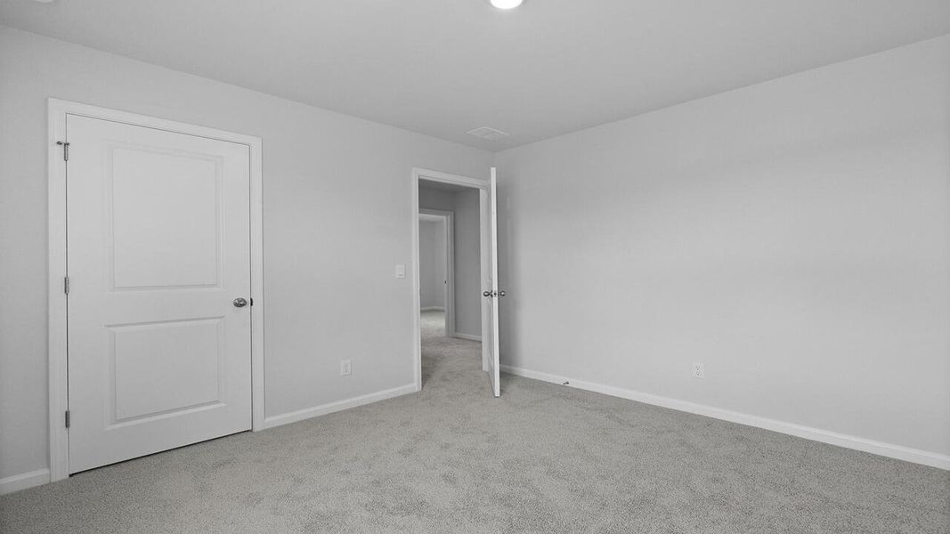 Spacious, unfurnished interior of a new home in Pine Hills at Cane Bay, Summerville (Image 22).