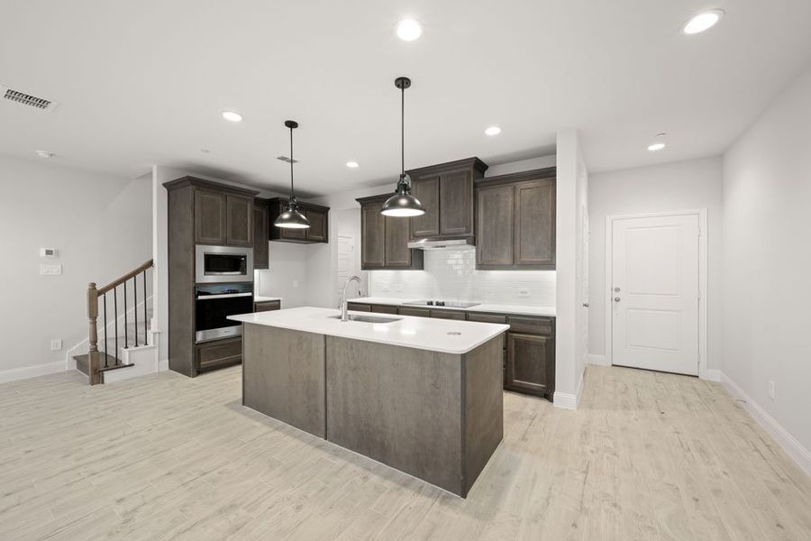 Representative exterior photo of a completed home built from the Bridgeport by Impression Homes in Main Street Village, Mansfield, TX (Image 6). Representative exterior photo of a completed home built from the Bridgeport by Impression Homes in Main Street Village, Mansfield, TX (Image 6).