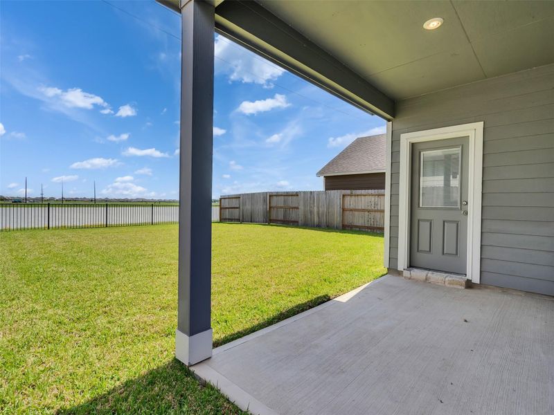 Exterior details and patio area of a home in Glendale Lakes, Arcola (Image 20).