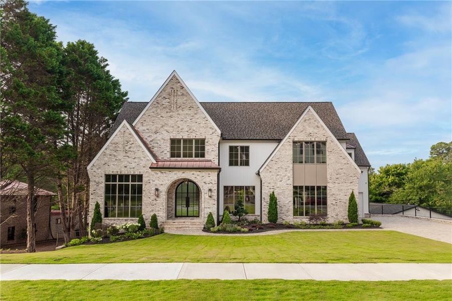 Front exterior of a new home in , Roswell, GA, highlighting curb appeal (Image 1). Front exterior of a new home in , Roswell, GA, highlighting curb appeal (Image 1).
