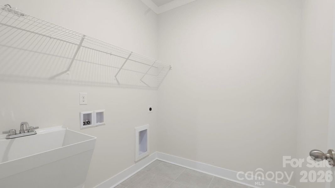 Spacious, unfurnished interior of a new home in Tap Root Farms, Hendersonville (Image 16).