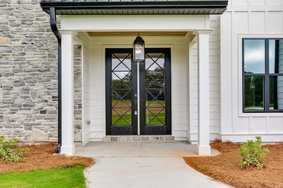 Front exterior of a new home in Harmon Springs, Carrollton, GA, highlighting curb appeal (Image 27).
