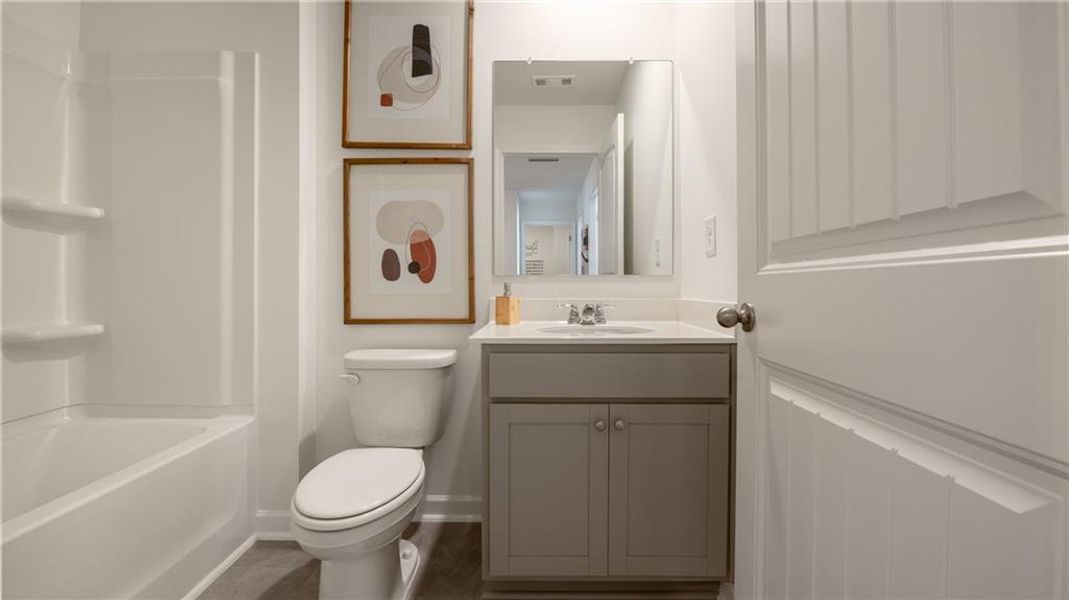 Furnished interior view inside a new home in Harvest Park, Decatur (Image 17).