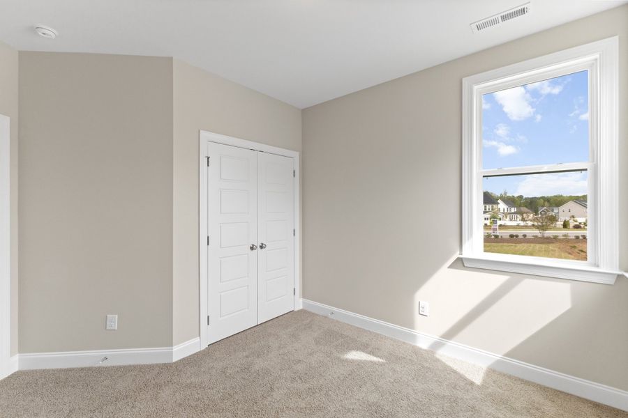 Representative unfurnished interior of a home built from the The Juniper by RobuckHomes in Kennebec Crossing, Angier (Image 104).