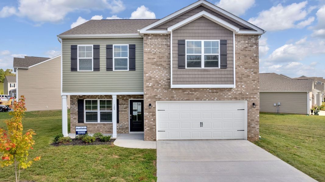 Representative exterior photo of a completed home built from the Penwell by D.R. Horton in Johnson Farms, Greeneville, TN (Image 1).