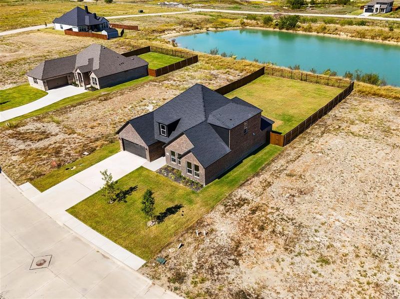 Front exterior of a new home in , Venus, TX, highlighting curb appeal (Image 2).