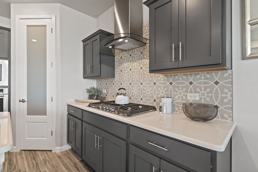 Representative furnished interior of a home built from the Valencia by Hakes Brothers in Hillside Park, El Paso (Image 17).