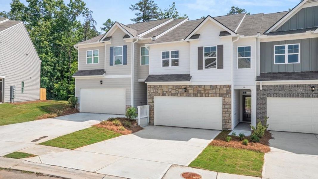 Front exterior of a new home in Mountain Park, Dahlonega, GA, highlighting curb appeal (Image 1). Front exterior of a new home in Mountain Park, Dahlonega, GA, highlighting curb appeal (Image 1).