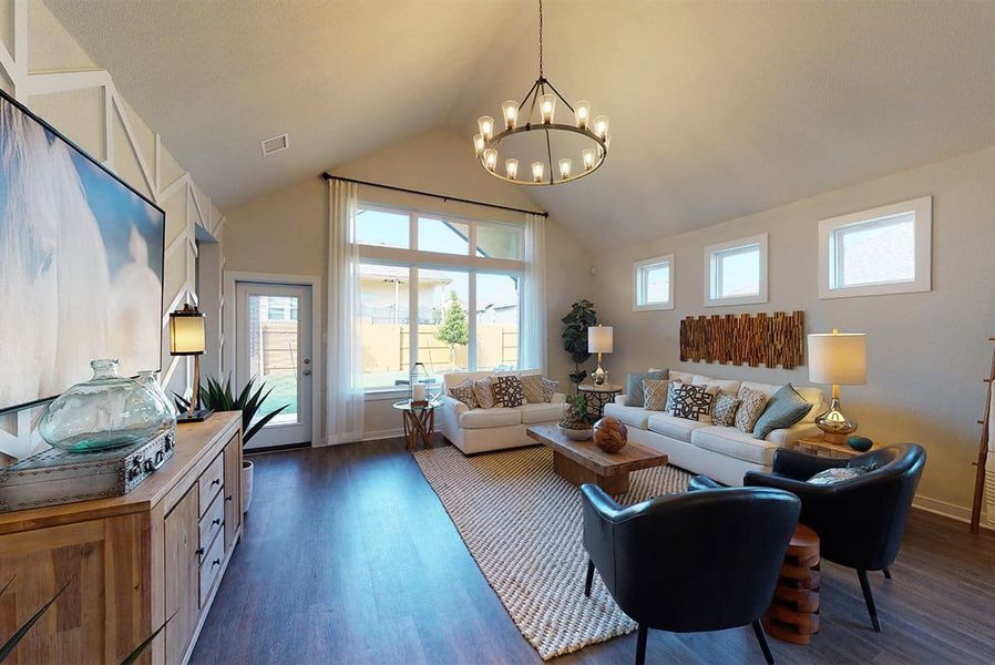 Representative furnished interior of a home built from the Austin by Chesmar Homes in Sunterra, Katy (Image 5).