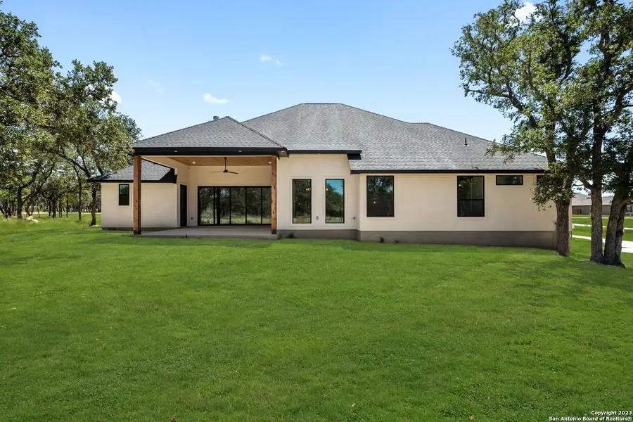 Exterior details and patio area of a home in , Castroville (Image 5).