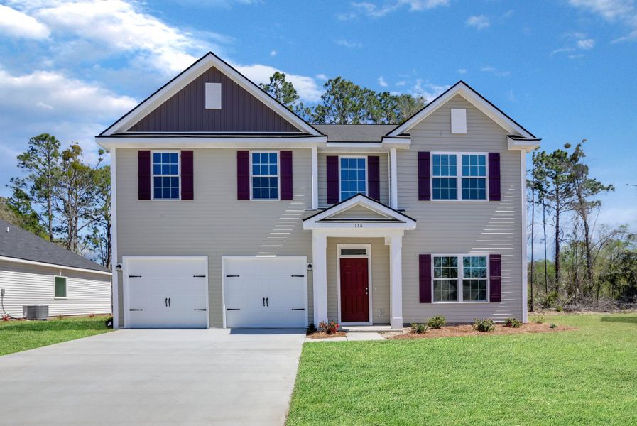 Representative exterior photo of a completed home built from the The Cedar Creek by RTS Homes in Grand Reserve, Hinesville, GA (Image 2).