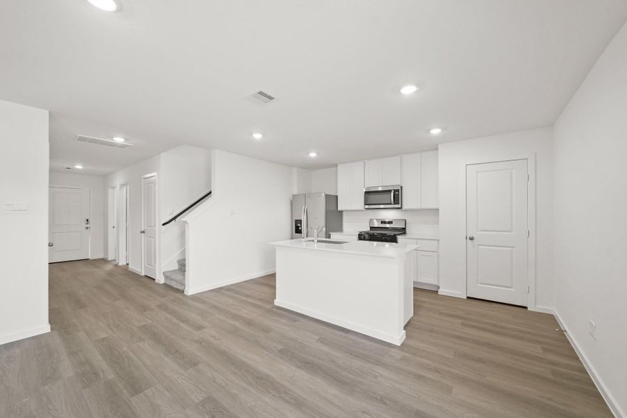 Furnished interior view inside a new home in Sunterra, Katy (Image 2). Furnished interior view inside a new home in Sunterra, Katy (Image 2).